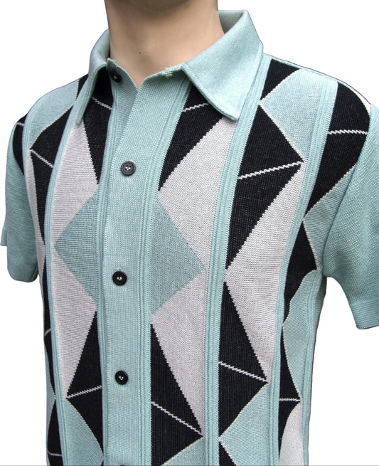 Mannequin wearing a light blue cardigan with black and white geometric pattern