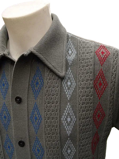 Gray knitted vest with geometric pattern on a mannequin against a blurred outdoor background