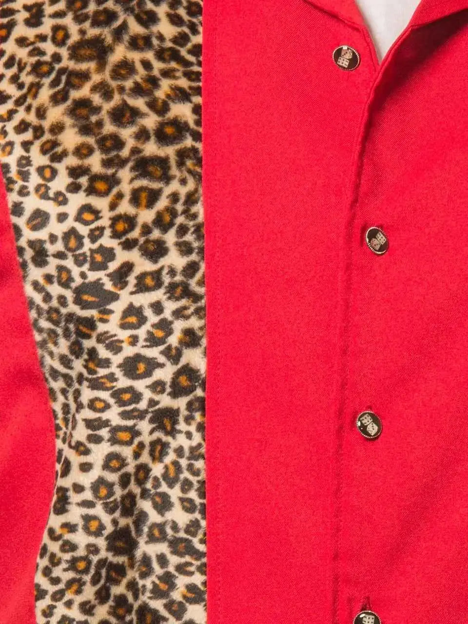 Red shirt with leopard print sleeve and visible buttons