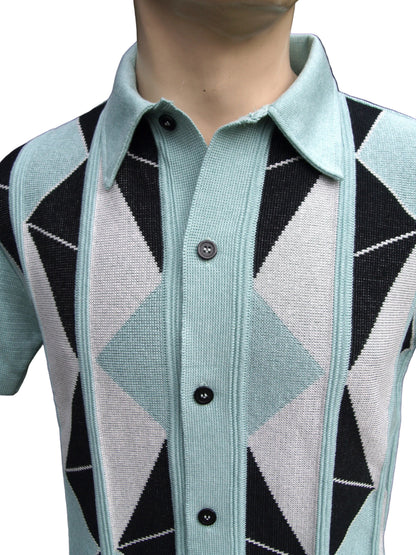 Mannequin wearing a light blue cardigan with black and white geometric pattern
